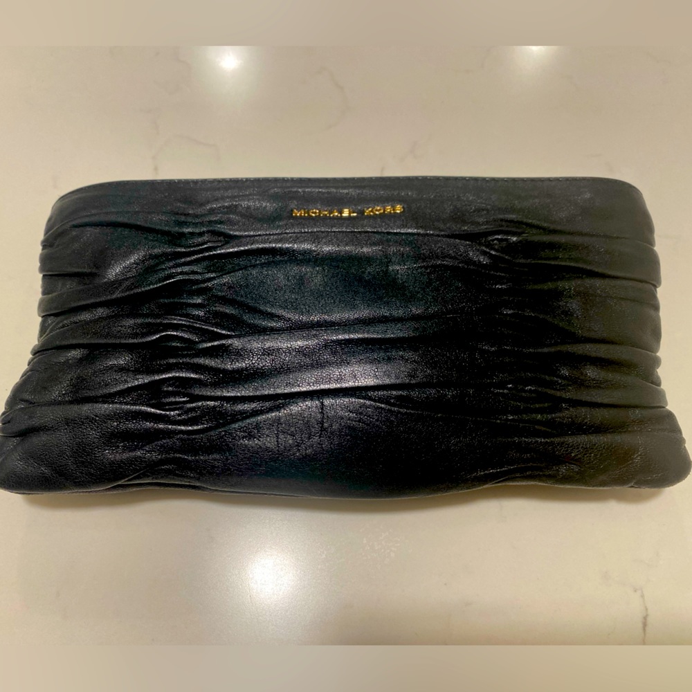 Michael Kors clutch. Black leather.